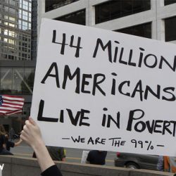 During Occupy protest, a sign with message that 44 Million Americans Live in Poverty.